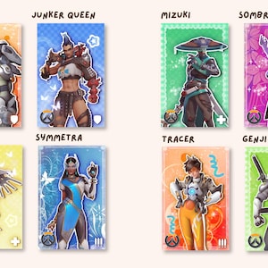 May include: A set of eight rectangular character cards featuring Overwatch heroes: Winston, Junker Queen, Mizuki, Sombra, Mercy, Symmetra, Tracer, and Genji. Each card displays a unique color background, character name, and a specific role icon.