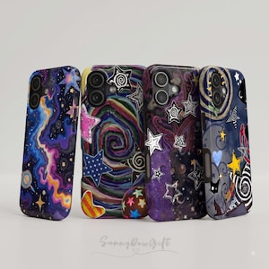 May include: Four smartphone cases featuring artistic designs. The first has a blue and purple nebula pattern. The second shows a colorful spiral with stars. The third displays a dark purple background with white stars. The fourth features a cat and stars.