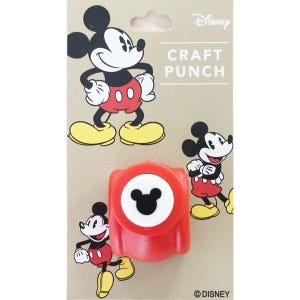 May include: A red Mickey Mouse craft punch with a black Mickey Mouse head-shaped punch. The packaging features illustrations of Mickey Mouse in his classic outfit. The text "CRAFT PUNCH" is printed on the packaging. The Disney logo is visible.