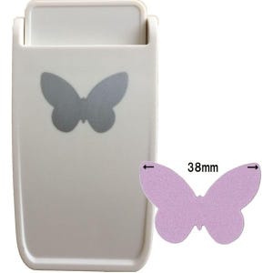 May include: A white butterfly-shaped paper punch with a grey butterfly design. A 38mm lavender butterfly cutout is next to the punch. The punch has a handle and is designed for crafting and scrapbooking.