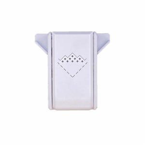 A white rectangular object with a diamond-shaped design on it.