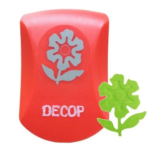 May include: A red flower-shaped paper punch with a grey flower design and the word "DECOP" in white. A green flower cut-out is next to the punch. Suitable for crafting and scrapbooking.