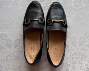 Mocassins Alex Marie 4 Feature Technology en cuir noir avec mors doré, pointure 9,5 M pour femme