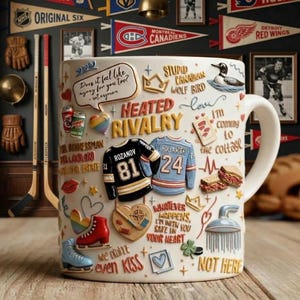 May include: A white ceramic mug decorated with hockey-themed graphics and text. The mug features images of hockey jerseys, a heart, and phrases like "Heated Rivalry" and "Whatever happens, I'm with you." Hockey memorabilia decorates the background.