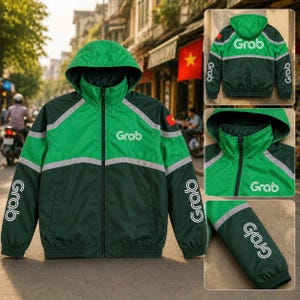 May include: Green and dark green hooded jacket with the word "Grab" printed on the chest and sleeves. The jacket has a reflective silver stripe across the chest and sleeves. The jacket has a zip closure.