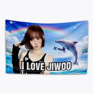 May include: A tapestry featuring a woman with short brown hair, wearing a black and white top. The tapestry has a vibrant background with a rainbow, ocean, and a dolphin. Text on the tapestry reads "I LOVE JIWOO".