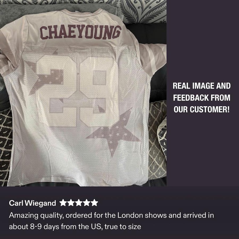 May include: A light-colored jersey with the name "CHAEYOUNG" across the upper back and the number "29" on the back and front. The number and name are in a darker color. The jersey has a star design.