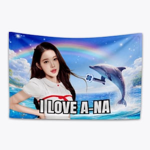 May include: A wall tapestry featuring a woman with long dark hair, a dolphin, and a rainbow against a blue sky. The text "I LOVE A-NA" is displayed in a white font.