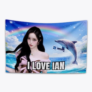 May include: A tapestry featuring a woman with long black hair, a dolphin, and a rainbow over a tropical beach scene. The text "I LOVE IAN" is displayed in white block letters across the bottom of the tapestry.