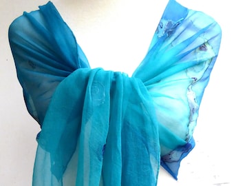 Silk scarf painted in different shades of blue and petrol