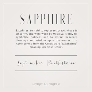 May include: A graphic design with the word "SAPPHIRE" in large, bold letters. The text below explains that sapphires represent grace, virtue, and sincerity. It also states that sapphires were worn by Medieval clergy to symbolize holiness and attract heavenly blessings and wisdom. The text also explains that the name comes from the Greek word "sappheiros", meaning "precious stone". The text "September Birthstone" is written in cursive script below the text about sapphires. The text "ARTIQUE BOUTIQUE &copy;" is at the bottom of the graphic.