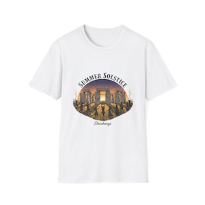 May include: White t-shirt featuring a graphic of Stonehenge with the text "Summer Solstice" and "Stonehenge". The illustration depicts people celebrating the solstice. The design is centered on the front of the shirt.
