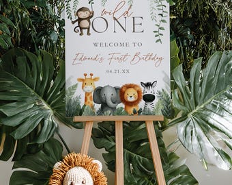 Placa de boas-vindas para aniversário com tema "Wild One", decoração para o primeiro aniversário de menino, placa de boas-vindas para aniversário com animais da savana, decoração para festa na selva, modelo editável do Canva.