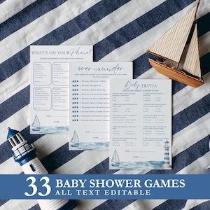 May include: Baby shower games with nautical themes, including trivia and fill-in-the-blank cards. The cards feature sailboat illustrations and are accompanied by a wooden sailboat and a lighthouse figurine. The text "33 BABY SHOWER GAMES ALL TEXT EDITABLE" is displayed.