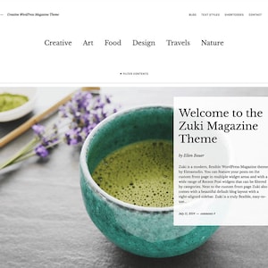 May include: A website design featuring a teal bowl of matcha tea, lavender sprigs, and the text "Welcome to the Zuki Magazine Theme." The website's navigation includes "Creative," "Art," and "Food."