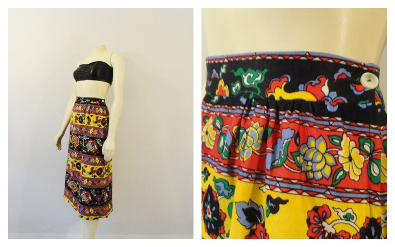 Puede incluir: Una falda vintage colorida con estampado floral en tonos rojos, amarillos, azules, verdes y negros. La falda tiene una cintura fruncida y un cierre de bot&oacute;n.