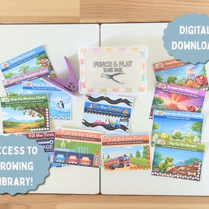 May include: A selection of illustrated educational cards with titles like "Feed the Animals!" and "Fix the Roads!" A purple punch tool and a box marked "PUNCH & PLAY TASK BOX" are visible. The words "DIGITAL DOWNLOAD" and "ACCESS TO GROWING LIBRARY!" are also displayed.