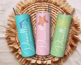 May include: Three stainless steel tumblers with black straws, each with a different design. One is teal with a dolphin, one is pink with a starfish, and one is green with a pineapple. Each tumbler has the name "Danielle" and "LOCATION 2025" in white script.