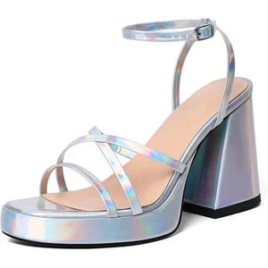 May include: Iridescent platform sandals with a chunky heel. The open-toe design features multiple straps across the foot and an ankle strap with a buckle closure. The heel is approximately 4 inches high.