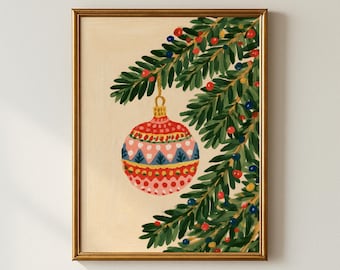 May include: A framed painting on a cream background featuring a green pine branch with red and blue berries. A round, patterned Christmas ornament in shades of red, pink, and blue hangs from the branch, displaying horizontal bands of dots and triangles.