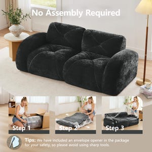 May include: A black velvet-textured sofa with a tufted design and rounded armrests. The image includes text stating No Assembly Required and instructions showing the sofa being removed from a box, unwrapped from plastic, and expanded.