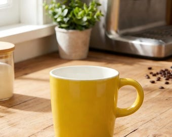 A six-piece coffee cup set, each with a capacity of 4 ounces, made of porcelain.