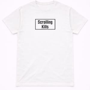 May include: White t-shirt with the text "Scrolling Kills" in a black rectangular box. The shirt has a crew neck and short sleeves. The text is centered on the chest.