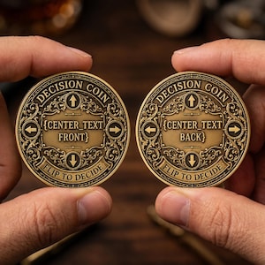 May include: Two circular brass-toned metal decision coins featuring ornate filigree borders. The text DECISION COIN is at the top, FLIP TO DECIDE at the bottom, and arrows pointing in four directions. One coin reads {CENTER_TEXT FRONT} and the other {CENTER_TEXT BACK}.
