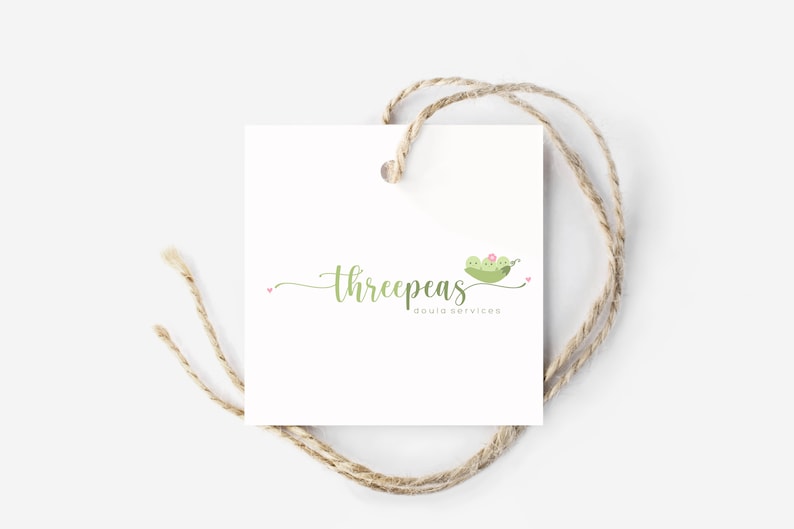 May include: A white square tag with a green peapod logo and the text "threepeas doula services".