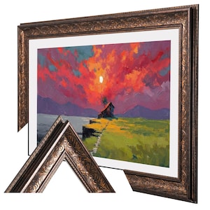May include: A framed landscape painting with a sunset in red and orange tones. The artwork shows a small house on a grassy cliff, with mountains in the background. The ornate, bronze-coloured frame adds a classic touch.