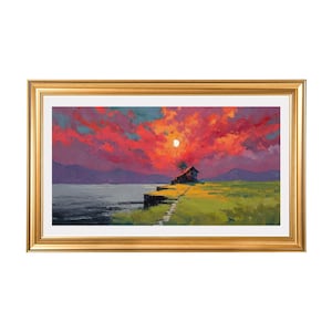 May include: A framed landscape painting shows a sunset over a coastal scene. The sky is filled with vibrant red and orange hues, with a full moon. A small house sits on a cliff overlooking the water, with a path leading to it.