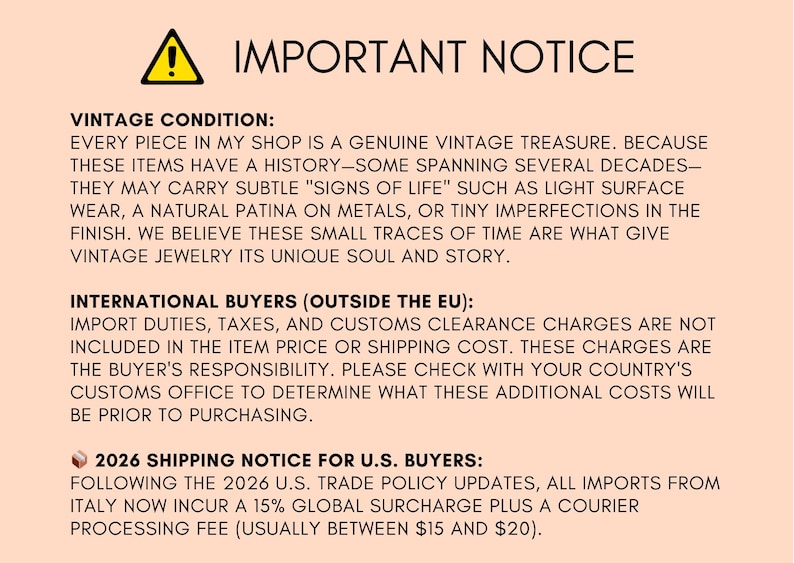 May include: A peach-colored notice with black text and a yellow warning symbol. The text includes a vintage condition statement, information for international buyers, and a 2026 shipping notice for U.S. buyers.