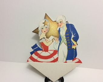 1920&#39;s gold gilded die cut chas. Clark patriotic place card lady and man in white pompadour wigs,red white,blue clothes large star