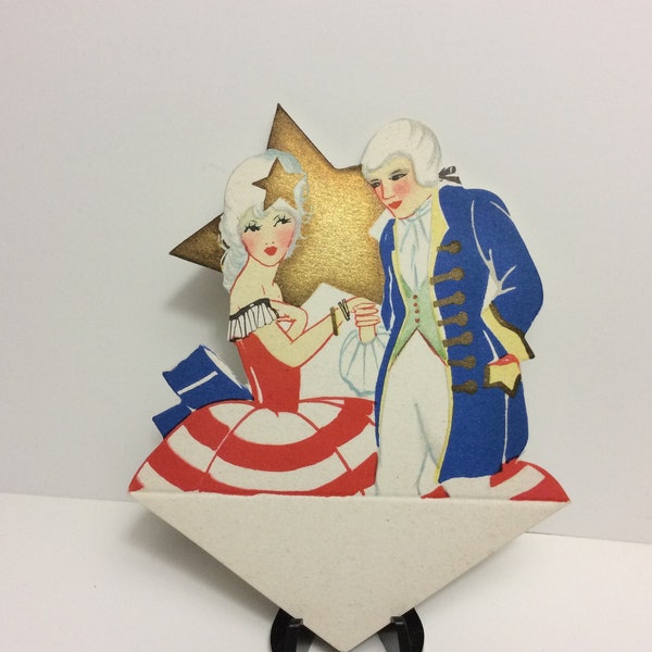 1920's gold gilded die cut chas. Clark patriotic place card lady and man in white pompadour wigs,red white,blue clothes large star