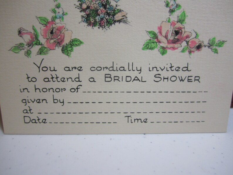 May include: A vintage bridal shower invitation card with a floral design. The card has a blank space for the bride's name, the host's name, the date, and the time of the shower.