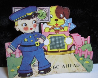 Sweet art deco 1930's die cut birthday greeting card dog driving a car cherubic faced police officer