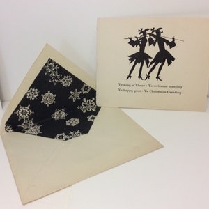 Vintage unused Art Deco 1920&#39;s-30&#39;s Christmas card black silhouette of medieval musicians playing violin and flute ,snowflake lined envelope