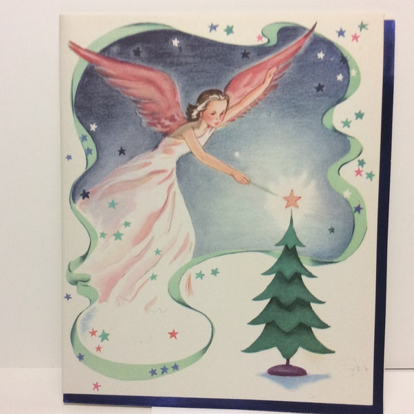 Gorgeous 1940's unused Whitman Christmas card pretty angel or fairy in pink w/ pink wings puts pink star on tree top with her wand