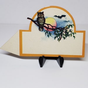 Unused circa 1920&#39;s-30&#39;s die cut halloween place card intense looking owl sits on tree branch under a full moon with bats flying towards him