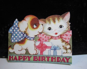 Vintage Sweet 1930's die cut embossed unused birthday card with kitten and puppy with wrapped gifts and big bows