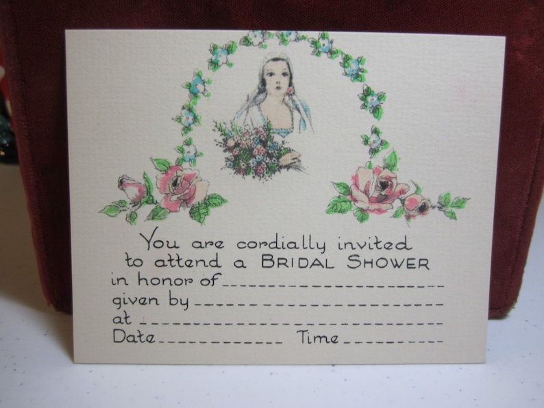 May include: A vintage bridal shower invitation card with a floral design and a bride in a white dress. The card has blank lines for the bride's name, the host's name, the date, and the time of the shower.