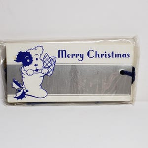 Art Deco unused 1930&#39;s 10 mip embossed silver gilded Christmas strung gift tags cut scotty dog inside a stocking and children w/ scotty dog