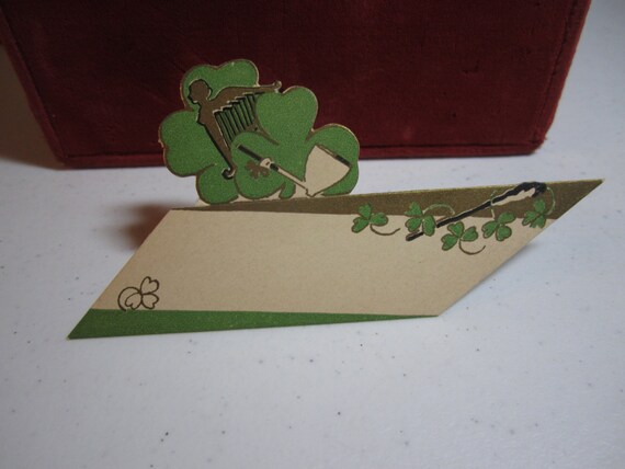 1920's-30's unused die cut gold gilded Gibson St. Patrick's Day place card green clovers with angle shaped harp, pipe graphics