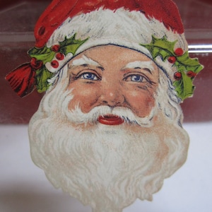 1920&#39;s Dennison Decorative Christmas cut- outs die cut Santa claus head with holly berry on his hat
