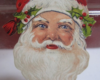 1920's Dennison Decorative Christmas cut- outs die cut Santa claus head with holly berry on his hat