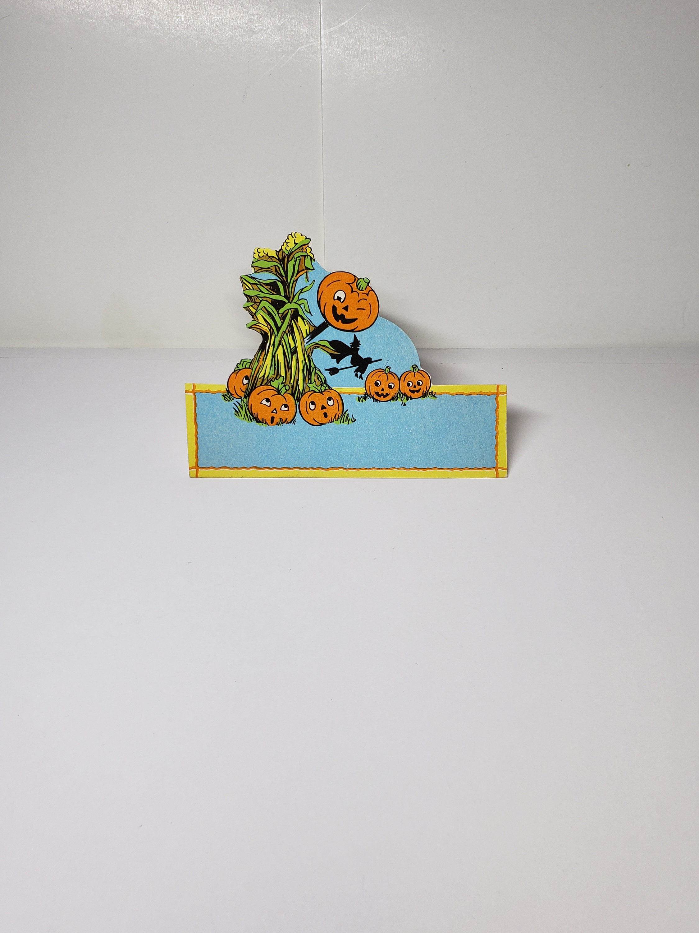 Vintage rare unused 1920's-30's die cut Halloween place card to display on drinking glass haystack with parade jol ,jols, witch