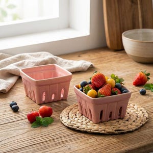 May include: A set of three ceramic mugs with a speckled, matte finish. The mugs are in shades of cream, light gray, and dark gray. Each mug has a simple, minimalist design and a rounded handle.