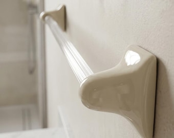 Ceramic towel bar set with plastic rod, wall-mountable