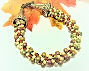 Antique Gold, Cream, Red and Mauve Seed Beaded Kumihimo Bracelet