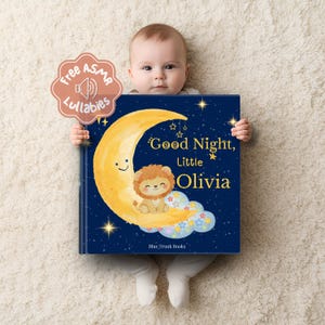 Peut inclure: Un livre pour enfants carré avec une couverture bleu foncé illustrée d'un croissant de lune jaune, d'un petit lion et d'étoiles colorées. Le texte indique Good Night, Little Olivia et Blue Trunk Books. Un badge rose indique Free ASMR Lullabies.